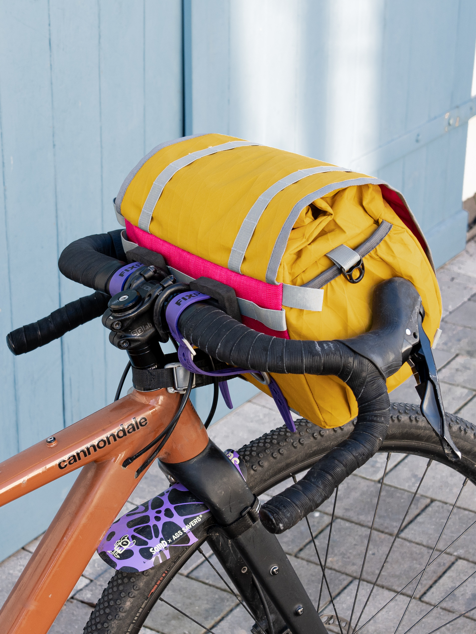 Small handlebar bag made from recycled X-Pac® RX30 in gold